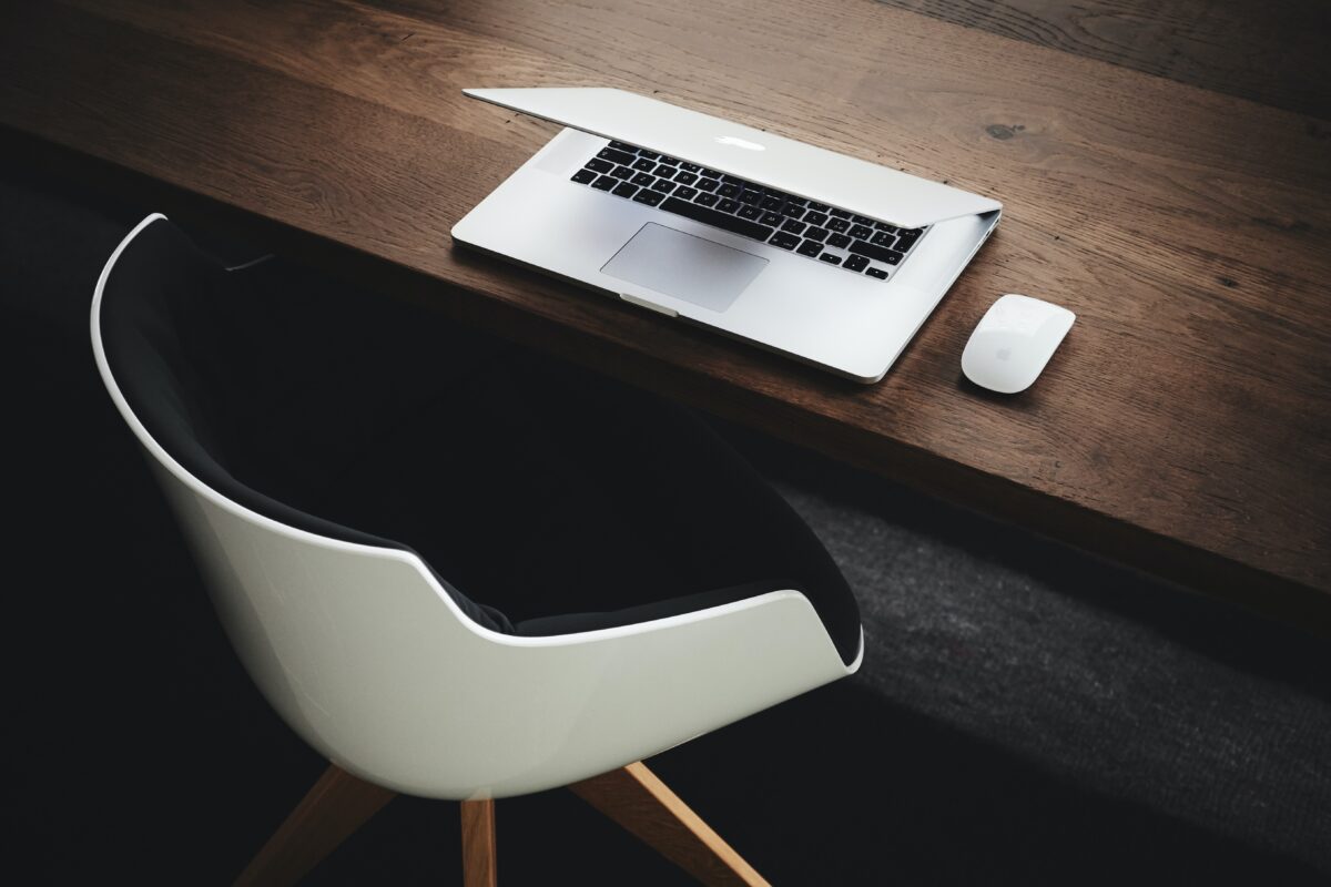 A marketing agency owner's laptop, used for planning a strategy for their account-based marketing services.