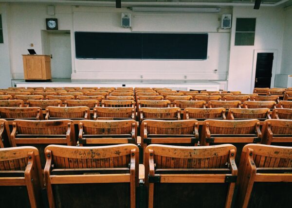 Picture of an auditorium that explains how lead generation for education can help find alumni who can donate.