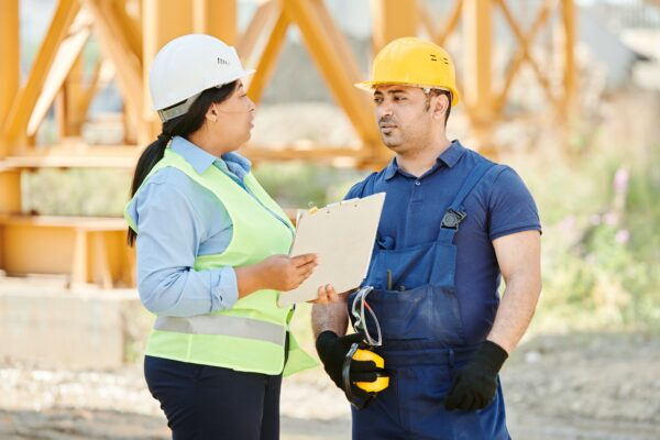 Construction company workers planning how to start their construction lead services