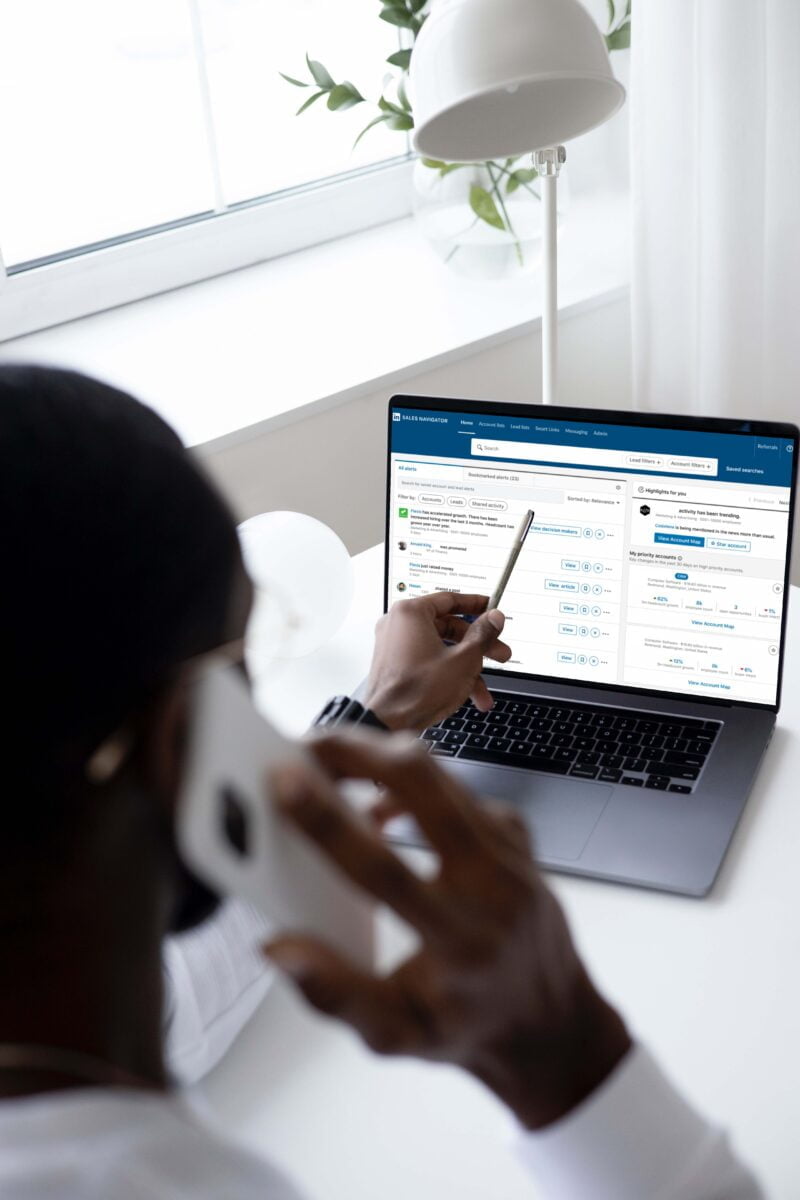 Lead Gen Specialist discussing a strategy on how to get leads on LinkedIn over the phone