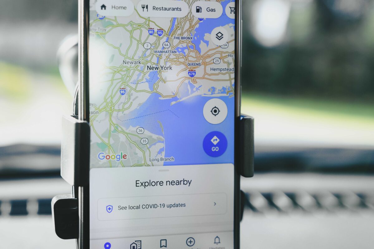 Smartphone screen displaying the Google Maps application used in local SEO construction strategies